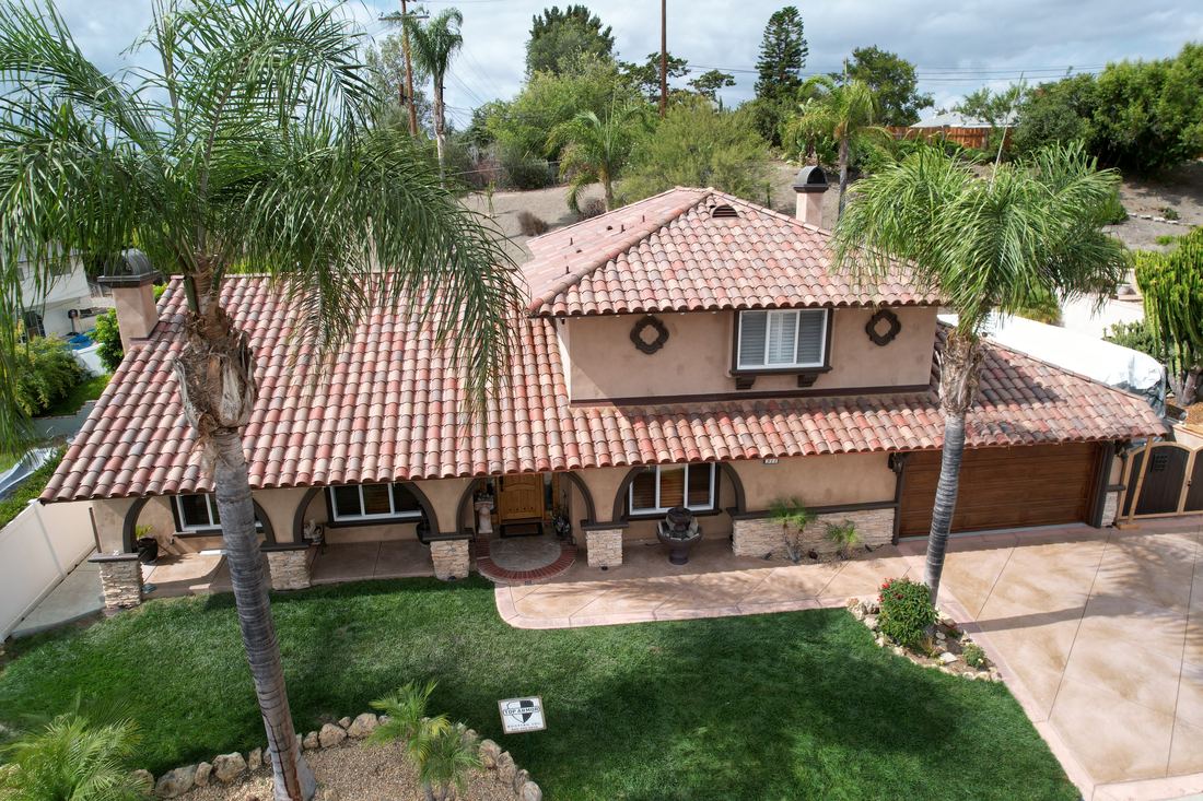 New blended clay tile roof on a Spanish-style home